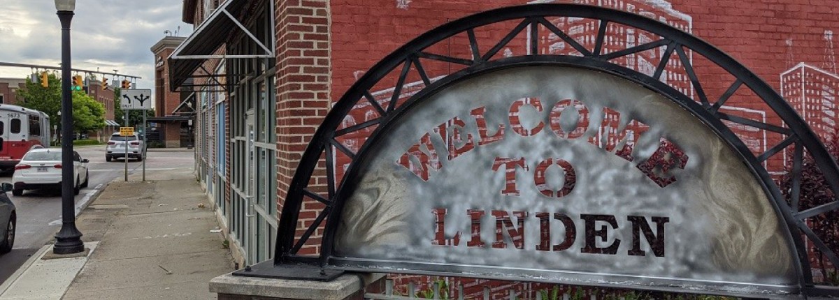 A welcome to Linden community sign. 
