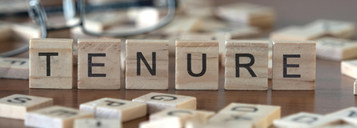 Scrabble board game pieces that spell tenure.  Image: Adobe Stock