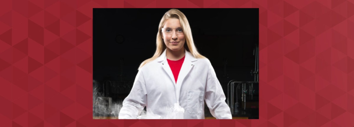 Madison Tuttle in a lab coat