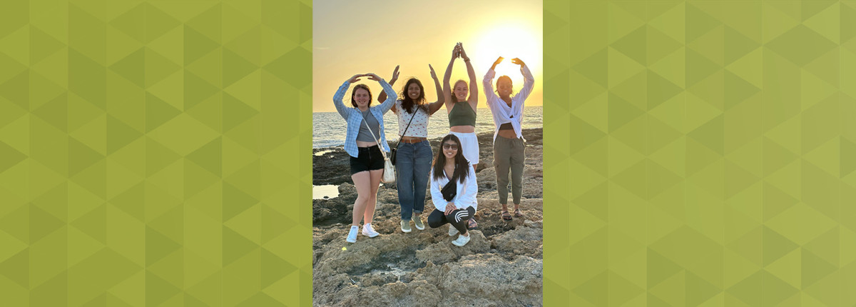 Students on a beach in Cyprus
