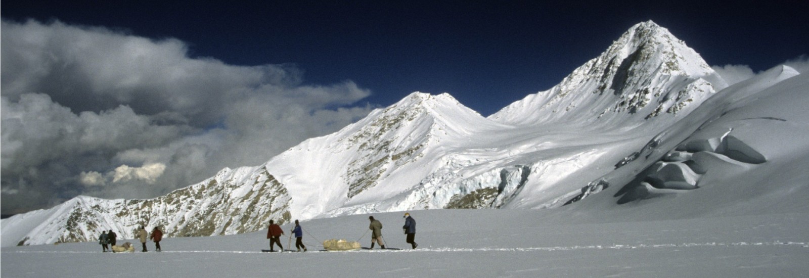 High altitude porters descending equipment and ice cores from the Dasuopu ice core drilling site.