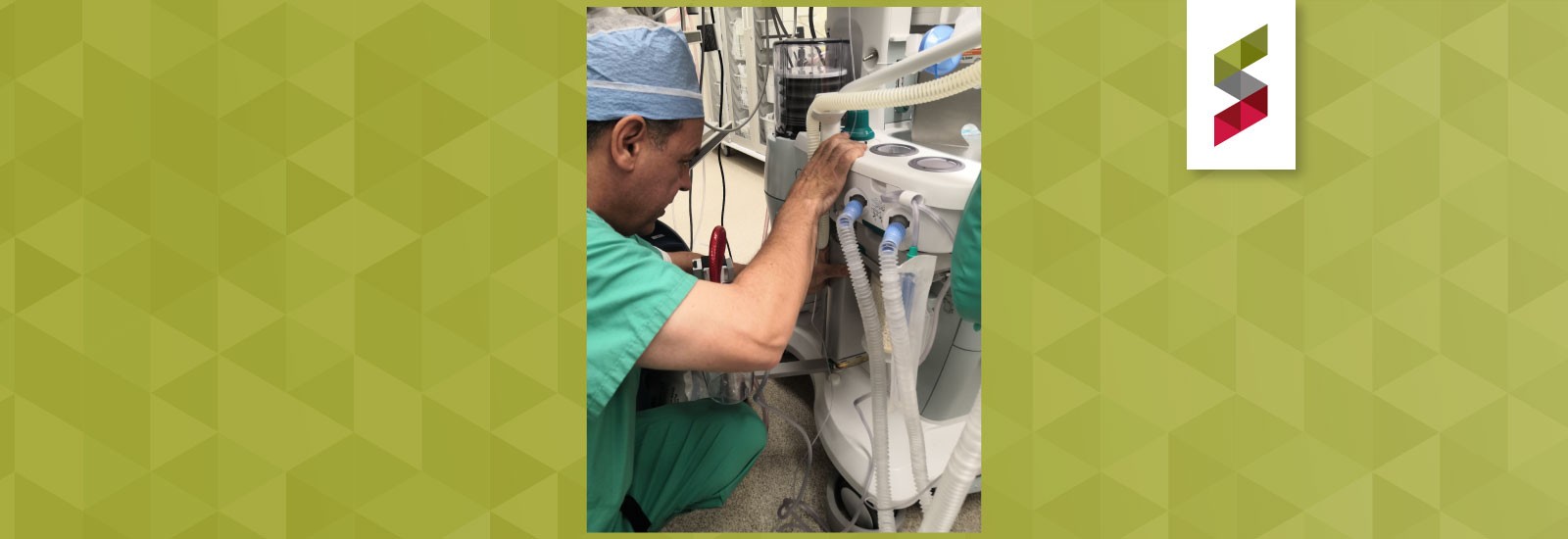 doctor checking anesthesia machine