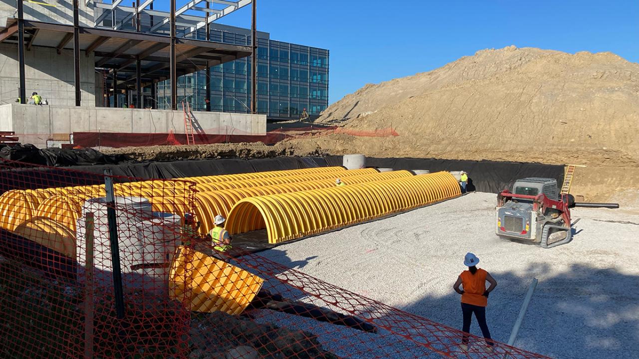 Worker stands in construction site