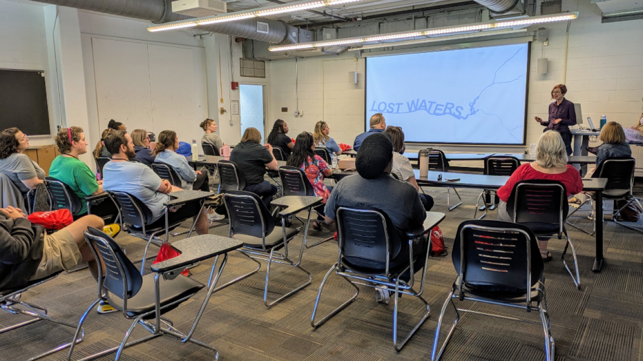 Faculty presenting to adult audience