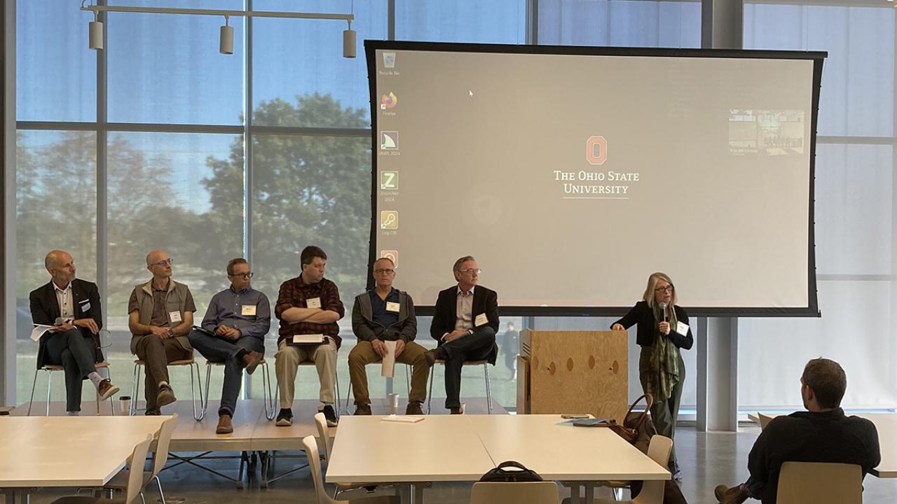 Panelist speakers sitting on stage